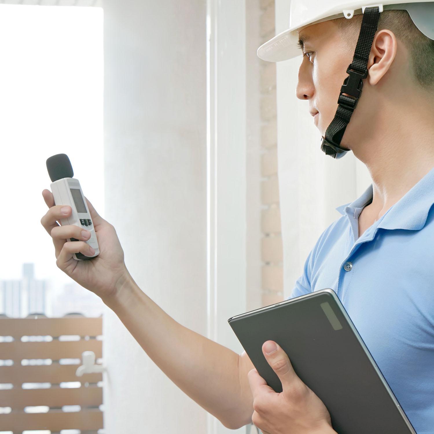 Acoustic-consultant completing acoustic sound study